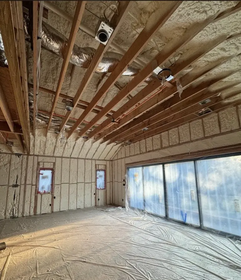Interior walls and ceiling insulated with spray foam during new construction in Yuba City